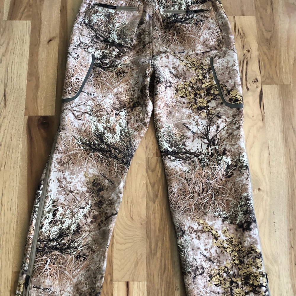 Worn one hunting season. No stain, odor, tears. Washed in unscented detergent
